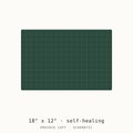 Schematic drawing of an 18 by 12 inch self-healing cutting mat, drawn to scale with a one-inch grid